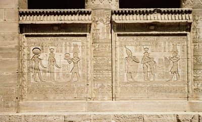 Two Reliefs Depicting a Pharaoh Making an Offering to Hathor and Horus, and Hathor Suckling the Young Ihy by Greco Roman